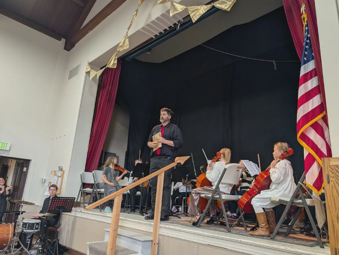 The orchestra on stage at Swisher Hall during a concert